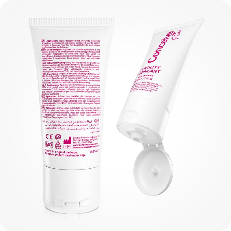 For Conceive Plus Men's Fertility Support and Fertility Lubricant Bundle, image showing back and front view of 30ml fertility lubricant tube—rear label features multilingual usage directions and regulatory symbols, while front-facing tube is tilted open to display flip-cap dispenser, all set against white backdrop.